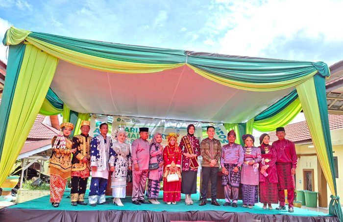 Pasangan Kepala Madrasah Raih Juara Harapan Lomba Fashion Show Baju Adat Jambi dan Melayu HAB ke-80 Kemenag RI